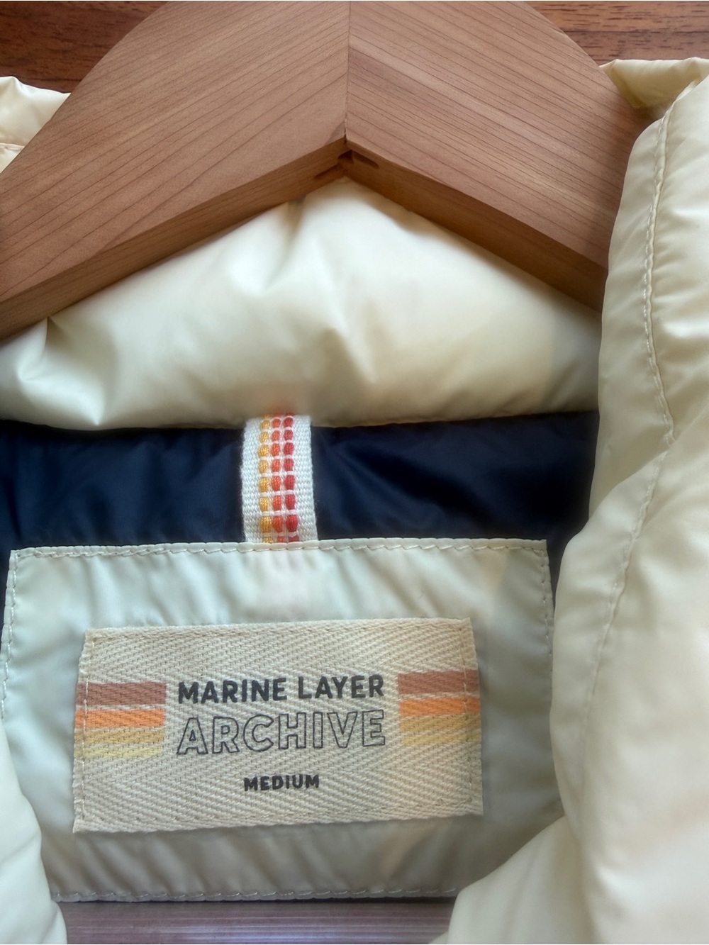 Marine Layer Cream Puffer Vest with Navy Lined Collar and Rainbow Trim - Picture 3 of 6